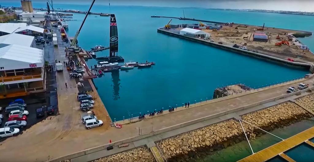 Bermuda bases - Feb 6, 2017. The four teams on the left have well established facilities, the French and Kiwi teams facilities are under construction on land which is still having reclamation work completed. The white tent in the centre is for Red Bull. The Kiwi base is by the yellow cranes on the left with the French on the right of the reclamation. Image from video by  bermemes.com © SW